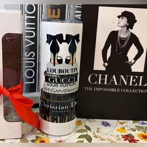 NIB LUXURY BRANDS PRINT TUMBLER 
COMES WITH SKINCARE PRODUCTS